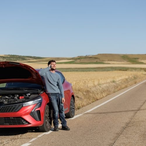 Displeased,Young,Adult,Man,Breaks,Down,Car,In,The,Middle