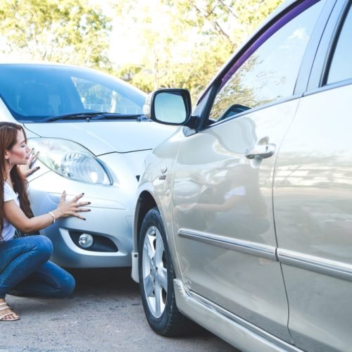 Asian,Woman,Is,Stressed,,She,Drives,A,Car,And,Has